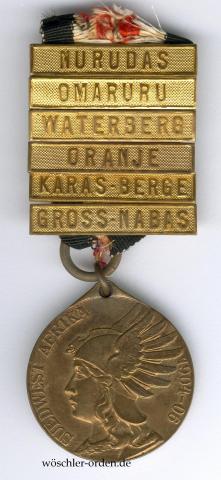 Deutsches Reich, Südwestafrika-Denkmünze mit sechs Gefechtsspangen NURUDAS, OMARURU, WATERBERG, ORANJE, KARAS-BERGE und GROSS-NABAS
