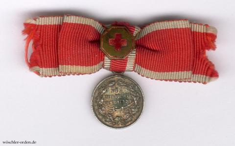 Schaumburg-Lippe, Militär-Verdienstmedaille mit dem Genfer Kreuz, Miniatur an Damenschleife